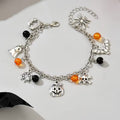 Halloween Metal Bracelet Featuring Ghosts, Bats, Spider Webs, And Pumpkins on a Chain Bracelet