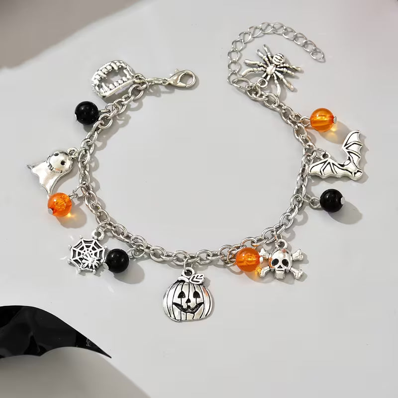 Halloween Metal Bracelet Featuring Ghosts, Bats, Spider Webs, And Pumpkins on a Chain Bracelet